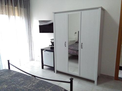 Postel nebo postele na pokoji v ubytování Caltagirone Casa Serena