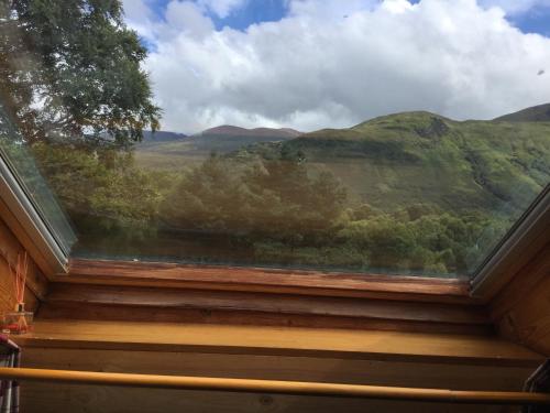 a window with a view of a mountain view at Inverlochy Villas (Adults Only) in Fort William