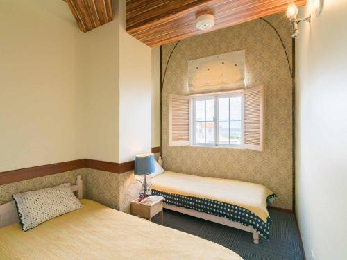 Postel nebo postele na pokoji v ubytování Auberge Bonne Chere Raout