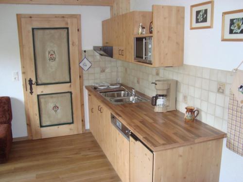 Kuchyň nebo kuchyňský kout v ubytování Haus Amann