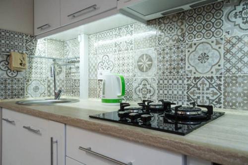 Dapur atau dapur kecil di Lotos for You Apartments