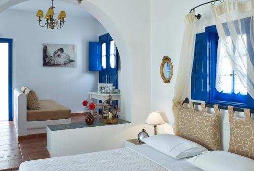 En eller flere senger på et rom på Folegandros Apartments