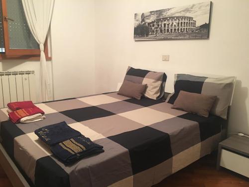 ローマにあるWelcome In Rome, EURのベッドルーム1室(大型ベッド1台、枕付)