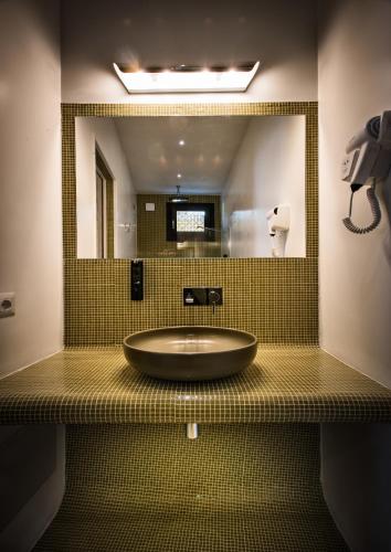 Un baño de Teku Sardinia Boutique Hotel