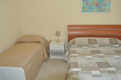 Postel nebo postele na pokoji v ubytování Aldebaran B&B