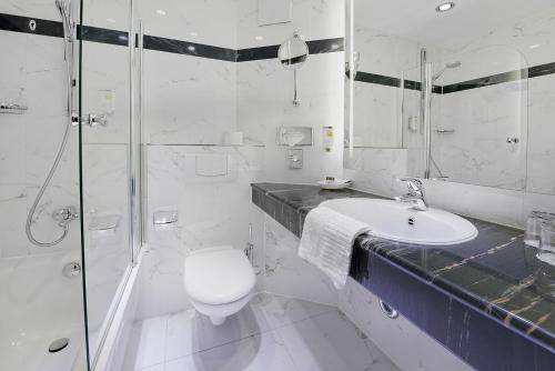 Phòng tắm tại Parkhotel Stader Hof