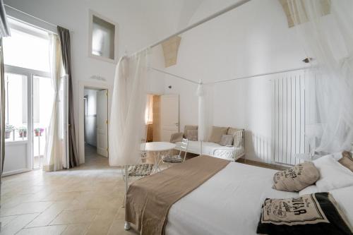 A bed or beds in a room at Nuvole Barocche