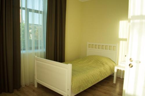 Кровать или кровати в номере Hotel Rafinad