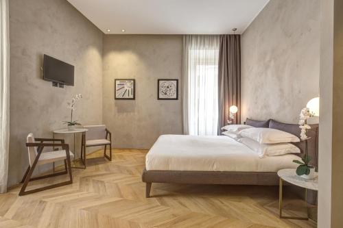 Posteľ alebo postele v izbe v ubytovaní G55 Design Hotel