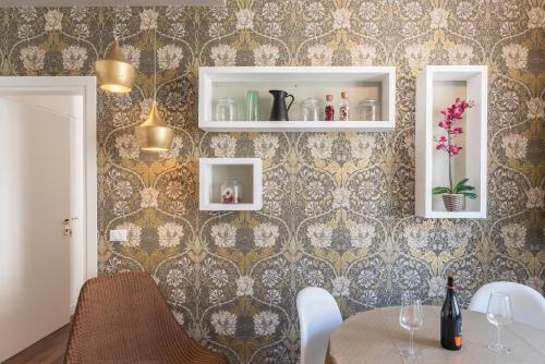 a dining room with a table and chairs at Guest Roma House in Rome