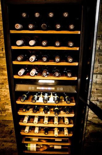 a wine cellar filled with lots of wine bottles at Vinařský penzion Přední Hora in Velké Bílovice