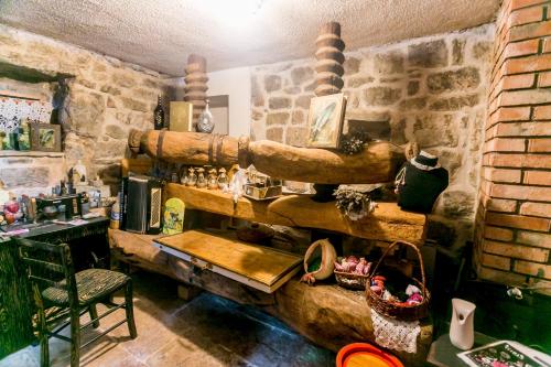 a room with a table and a chair in a room at Luštica Apartments in Lustica