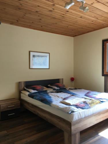 Кровать или кровати в номере Konnaoja Holiday Home