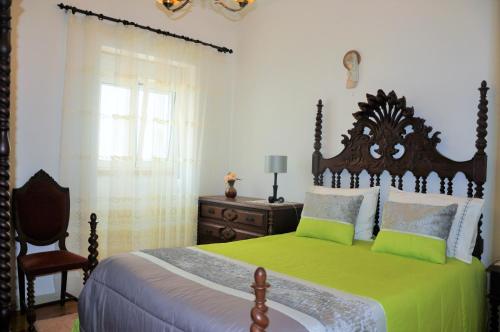 A bed or beds in a room at Casa de Zira