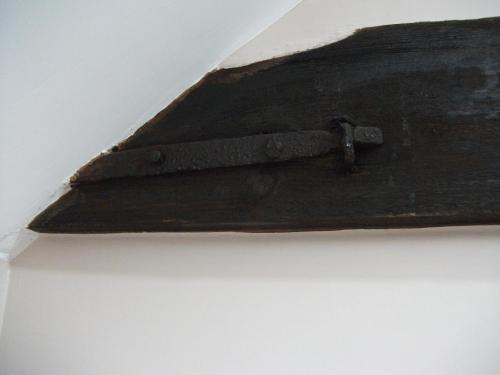 a wooden beam on top of a ceiling at Al Forno Restaurant & Inn in Norwich