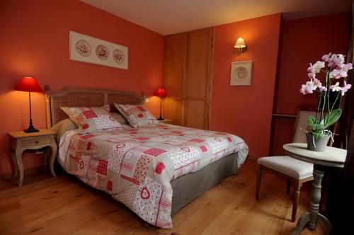En eller flere senge i et værelse på Les Songes de l'Abbaye