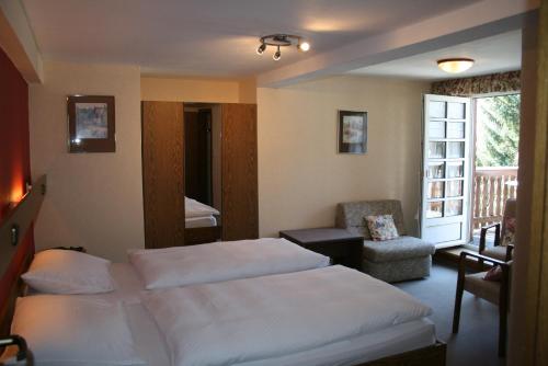 เตียงในห้องที่ Mosel Weinhotel Steffensberg