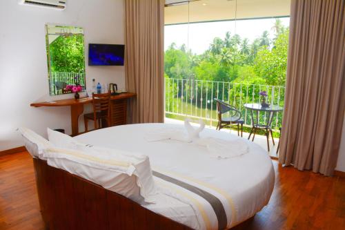 Postel nebo postele na pokoji v ubytování Arena Hotel