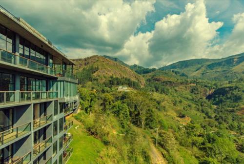 a building with a view of the mountains at Oak Ray Tea Bush in Ramboda