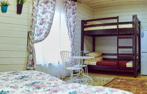 Uma ou mais camas em beliche em um quarto em Hotel Sofia