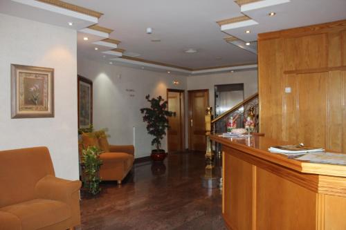 a lobby with a bar in a hospital at Nueva Colina in Tomiño