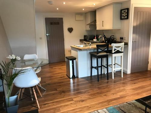 A cozinha ou cozinha compacta de Loft Living Oxford