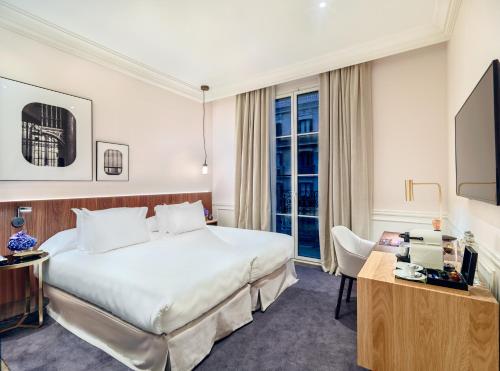 Una cama o camas en una habitación de H10 Casa Mimosa 4* Sup