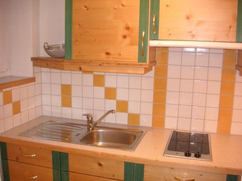 Kuchyň nebo kuchyňský kout v ubytování Gästehaus Manuela - Familie Rantner