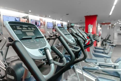a row of cardio machines in a gym at Clayton Hotel Cork City in Cork