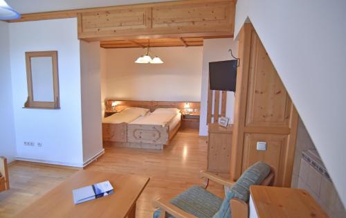 Postel nebo postele na pokoji v ubytování Hotel Ausseerland