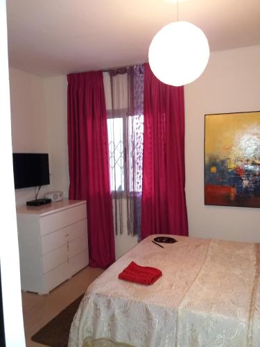 Ένα ή περισσότερα κρεβάτια σε δωμάτιο στο Maison Katia