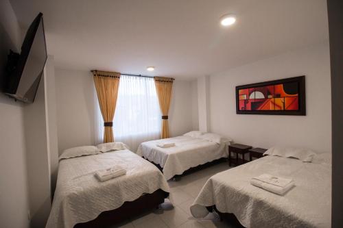 Кровать или кровати в номере HYG Hotel