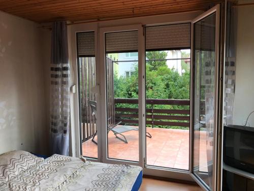 Postel nebo postele na pokoji v ubytování Apartment Jane