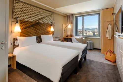 Cama o camas de una habitación en ibis Wien Hauptbahnhof