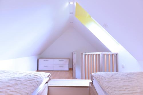 מיטה או מיטות בחדר ב-Apartment Bohinjko