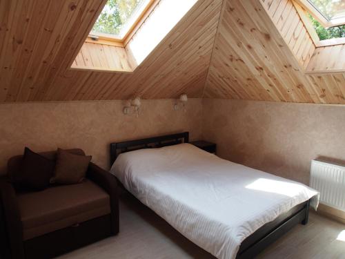 Postel nebo postele na pokoji v ubytování Kolmark Residence