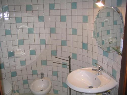 Ванна кімната в Elios Residence Hotel