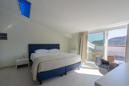 Ein Bett oder Betten in einem Zimmer der Unterkunft B&B Vistamare Suite