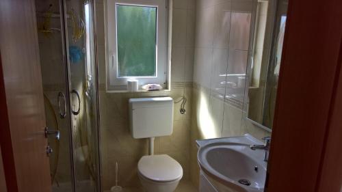 Koupelna v ubytování Apartment Poleti