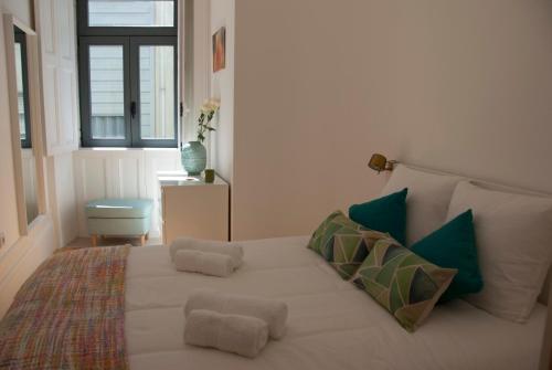 Ліжко або ліжка в номері OportoView Alegria Apartment