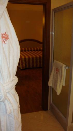 Postel nebo postele na pokoji v ubytování Albergo Corona