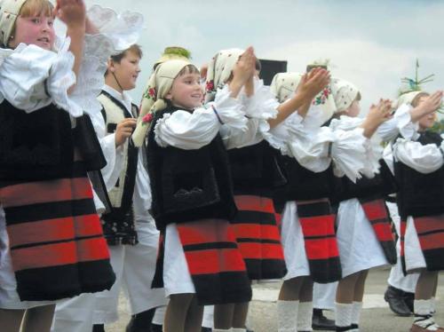a group of young girls in traditional norwegian clothing at Casa Muntean in Vadu Izei