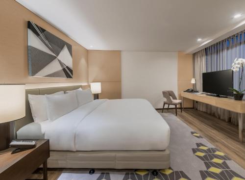 Una cama o camas en una habitación de Seda Vertis North