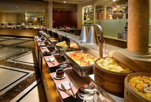 a buffet line with many different types of food at Le Midi Hotel Jungli in Zhongli