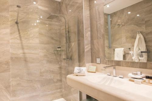 Koupelna v ubytování Hotel Le Dixseptième