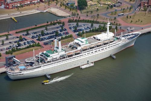 an aerial view of a cruise ship in the water at ss Rotterdam by WestCord in Rotterdam