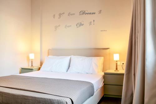 Ένα ή περισσότερα κρεβάτια σε δωμάτιο στο Athens Connection Apartments
