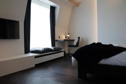Postel nebo postele na pokoji v ubytování B&B For 2-Wellness For 2