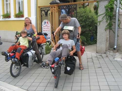 a group of people riding motorcycles on a sidewalk at Base for Adventurers - Urban Guerrilla in Negotin
