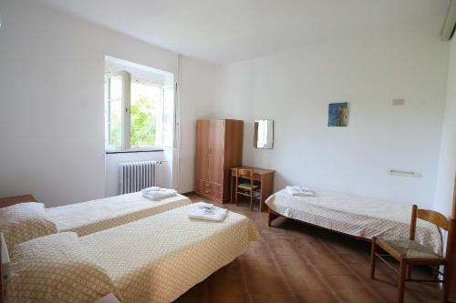 Postel nebo postele na pokoji v ubytování Santuario NS Soviore Cinque Terre